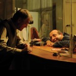 Robert Botto (Marcel Iures) and the Hotel receptionist (Nico